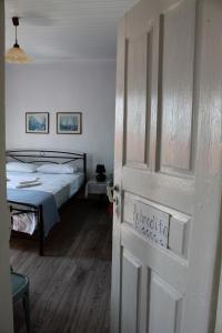 Posteľ alebo postele v izbe v ubytovaní Old Town Traditional Residence