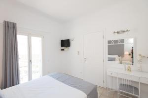 Postel nebo postele na pokoji v ubytování Villa Nireas