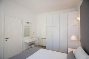 Postel nebo postele na pokoji v ubytování Villa Nireas