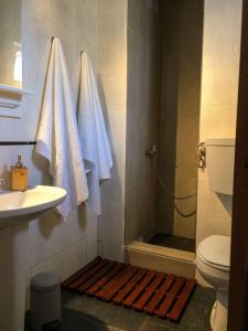 Ванная комната в Carrapateira Lodge