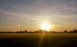 The sunrise or sunset as seen from a panziókat or nearby