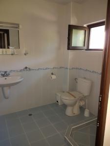 Ванная комната в Family Hotel Venera