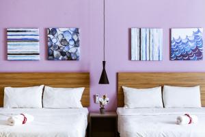 Postel nebo postele na pokoji v ubytování Da Men Sunway Subang By ODY Suites