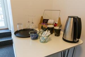 Удобства за правене на кафе и чай в Ansager Hotel og Hytteby