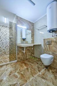 Ванна кімната в Apart Hotel-Crotiria