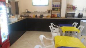 Kuchyň nebo kuchyňský kout v ubytování Casa e Suites