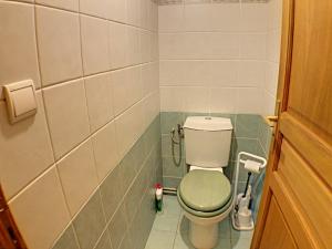 a small bathroom with a toilet in a room at L'Outa Panoramique in Chamonix +22 photos