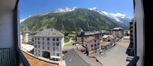 a view of a city with a mountain in the background at L'Outa Panoramique in Chamonix-Mont-Blanc