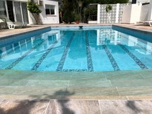 Bazén v ubytování Apartamento en el centro del Albir nebo v jeho okolí