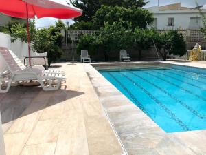 Bazén v ubytování Apartamento en el centro del Albir nebo v jeho okolí