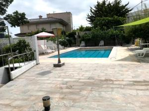 Bazén v ubytování Apartamento en el centro del Albir nebo v jeho okolí