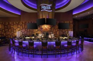 a large table in a room with purple lighting at Seneca Allegany Resort & Casino in Salamanca +31 photos