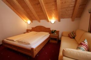 Una cama o camas en una habitación de Hotel Garni Litzner