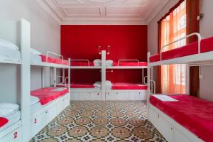 Postel nebo postele na pokoji v ubytování Red Nest Hostel