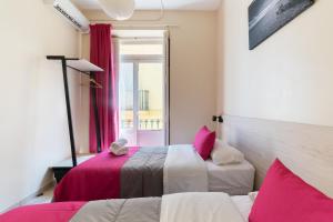 Postel nebo postele na pokoji v ubytování Red Nest Hostel
