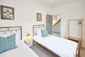 Postel nebo postele na pokoji v ubytování Host & Stay - Cornerhouse Apartments + 37 fotografií