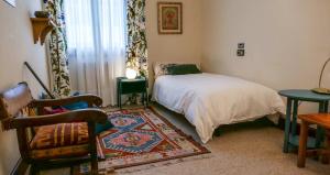 Een bed of bedden in een kamer bij Casa ALASKA