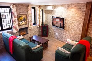 TV a/nebo společenská místnost v ubytování Casa Rural los Enebros