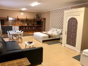 Posezení v ubytování Árkád Apartmanház Szeged