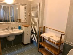 Koupelna v ubytování Árkád Apartmanház Szeged
