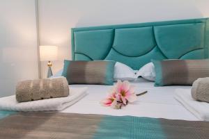 Posteľ alebo postele v izbe v ubytovaní Apartman Blue Paradise
