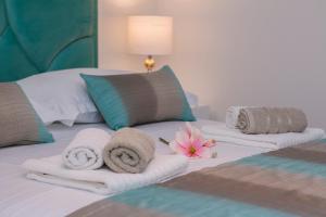 Posteľ alebo postele v izbe v ubytovaní Apartman Blue Paradise
