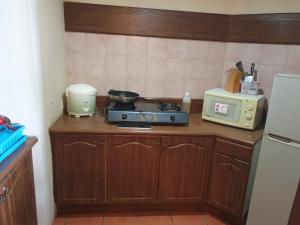 Kuchyň nebo kuchyňský kout v ubytování Apartemen Marbella anyer tower sadewa lt 5 view kolam renang & laut