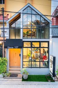 a house top with a lot of windows at I Rich Residence in Bangkok