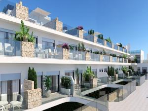 a rendering of a building with chairs and plants at Sukha Nara Apartment 47 in Gran Alacant