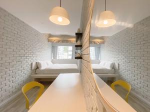 The Atelier Boutique Hotel客房内的一张或多张床位