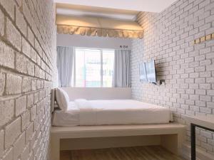 The Atelier Boutique Hotel客房内的一张或多张床位