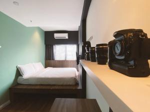 The Atelier Boutique Hotel客房内的一张或多张床位
