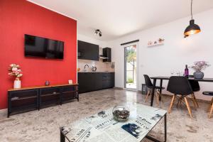 TV a/nebo společenská místnost v ubytování Apartment Medea, St. Martin