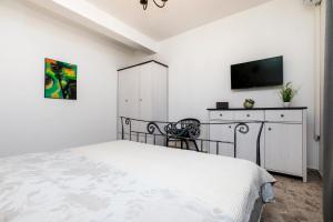 Postel nebo postele na pokoji v ubytování Apartment Medea, St. Martin