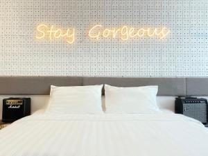 The Atelier Boutique Hotel客房内的一张或多张床位
