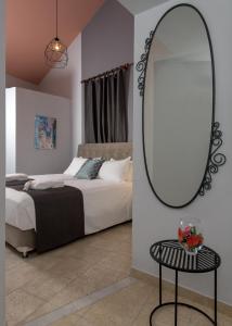 Letto o letti in una camera di Grace Hotel & Studios