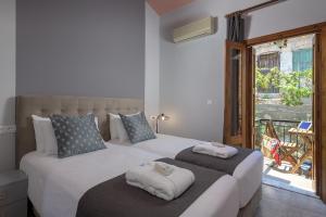Letto o letti in una camera di Grace Hotel & Studios