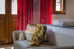 Letto o letti in una camera di Grace Hotel & Studios
