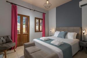 Letto o letti in una camera di Grace Hotel & Studios