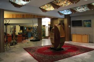 TV a/nebo společenská místnost v ubytování Hotel Costellazioni