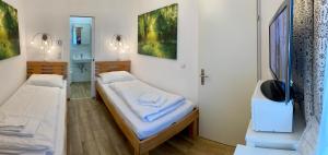 Кровать или кровати в номере AJO Vienna Central Room - Contactless Check-in