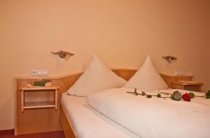 Un pat sau paturi într-o cameră la Ehstandhof