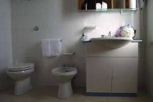 Koupelna v ubytování Hotel Costellazioni
