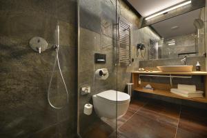 Kúpeľňa v ubytovaní Grand Hotel Hradec