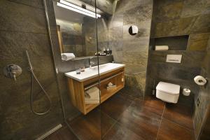 Kúpeľňa v ubytovaní Grand Hotel Hradec