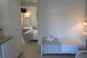 Krevet ili kreveti u jedinici u okviru objekta Corali Beach Hotel