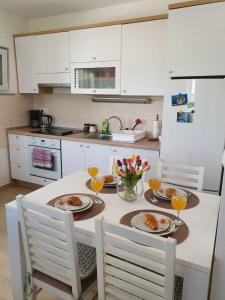 A kitchen or kitchenette at Marija Holiday Home