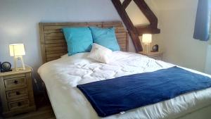 Postelja oz. postelje v sobi nastanitve Domaine de Gentilly