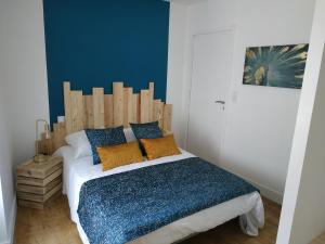 Ліжко або ліжка в номері Chambres d'hôtes "Le Verrie Cosy"
