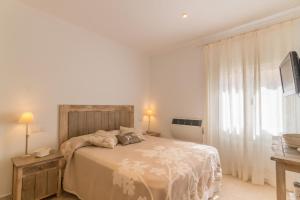 Posteľ alebo postele v izbe v ubytovaní Colonia de Sant Pere - 31506